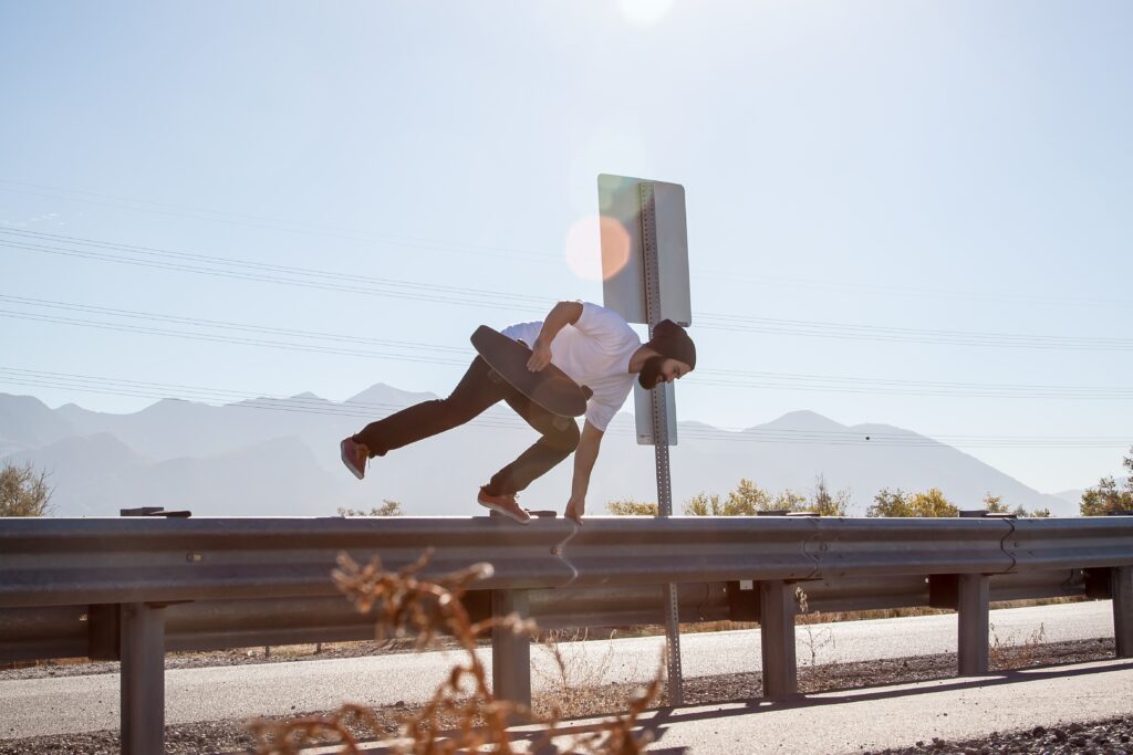 Man jumping over a barrier