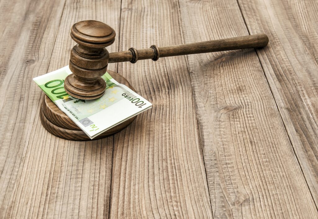 Auction mallet hammering down money