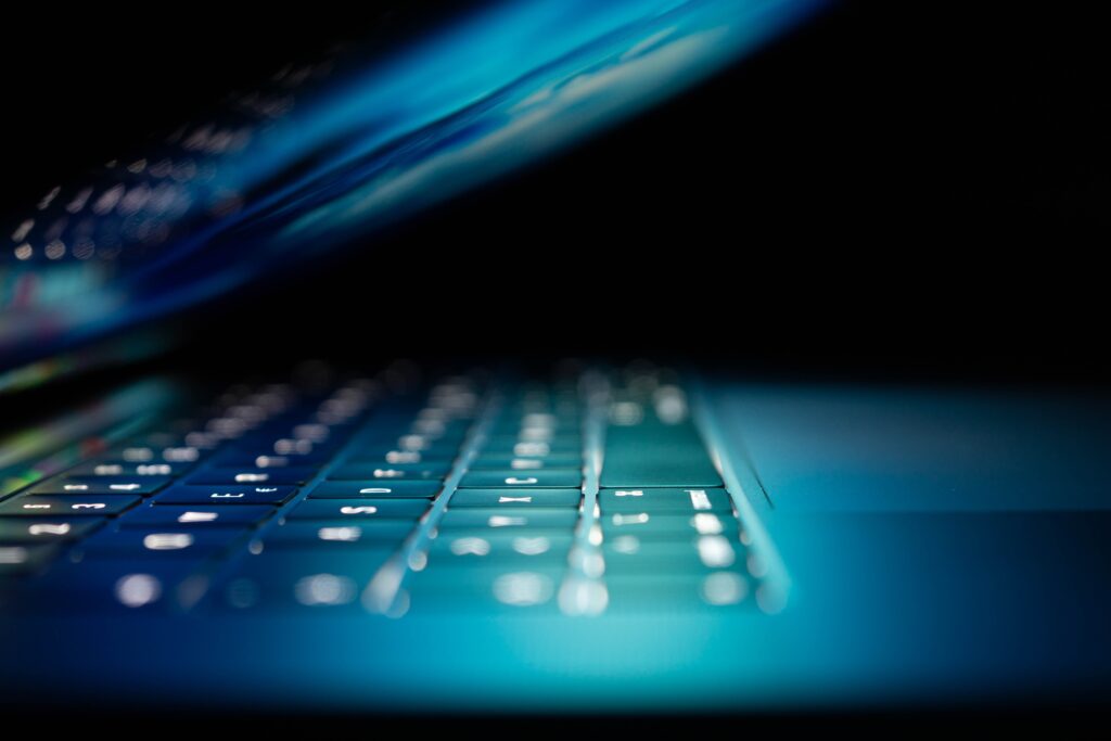 Laptop lit up at night