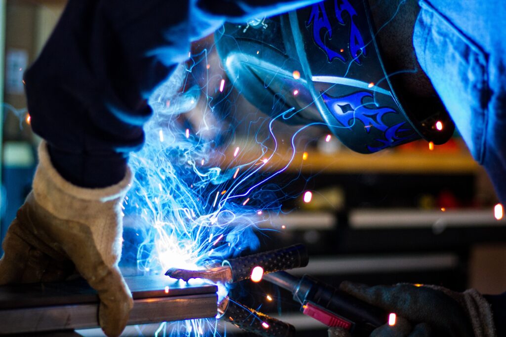 Image of a man welding