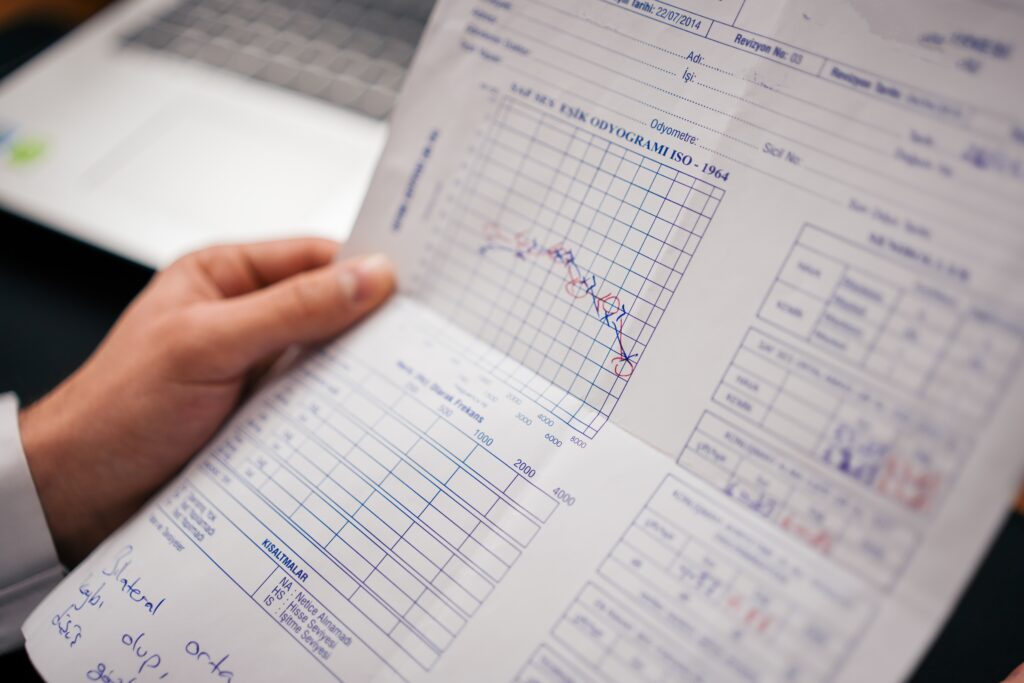 Image of a person holding a report